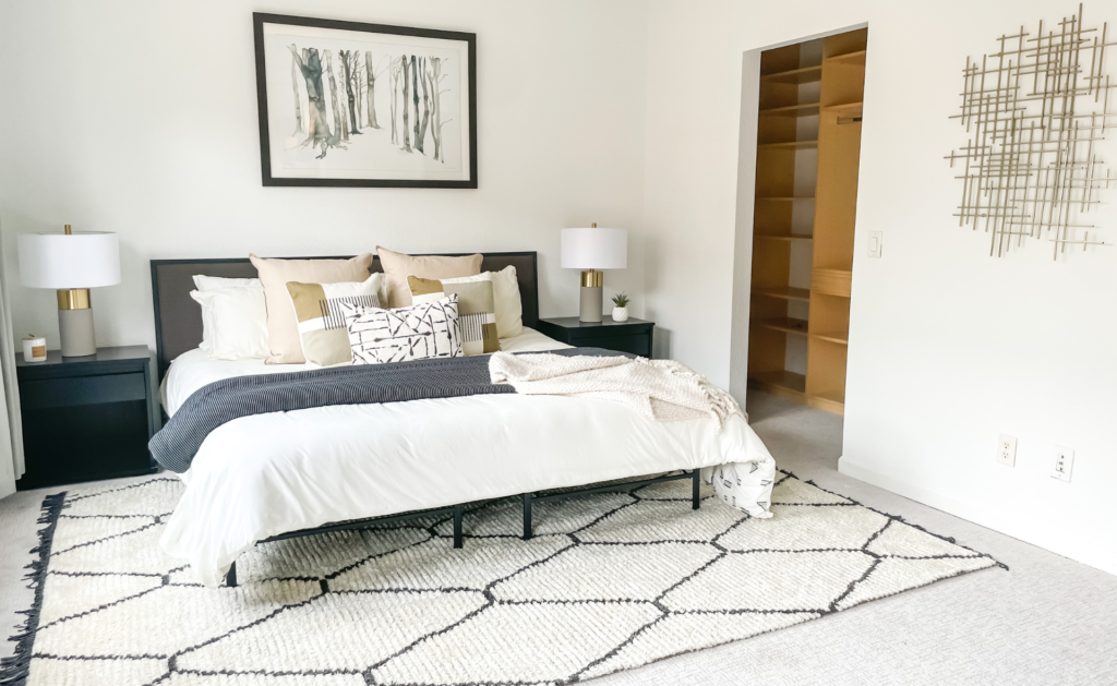 Professionally staged Denver home interior featuring modern furnishings, large windows and mountain view