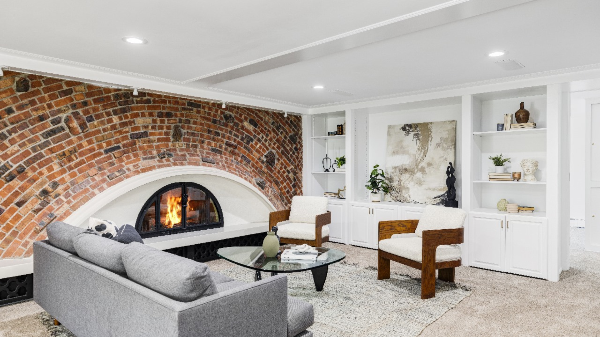 Staged Denver living room with organic modern design, featuring natural wood furniture and textured decor